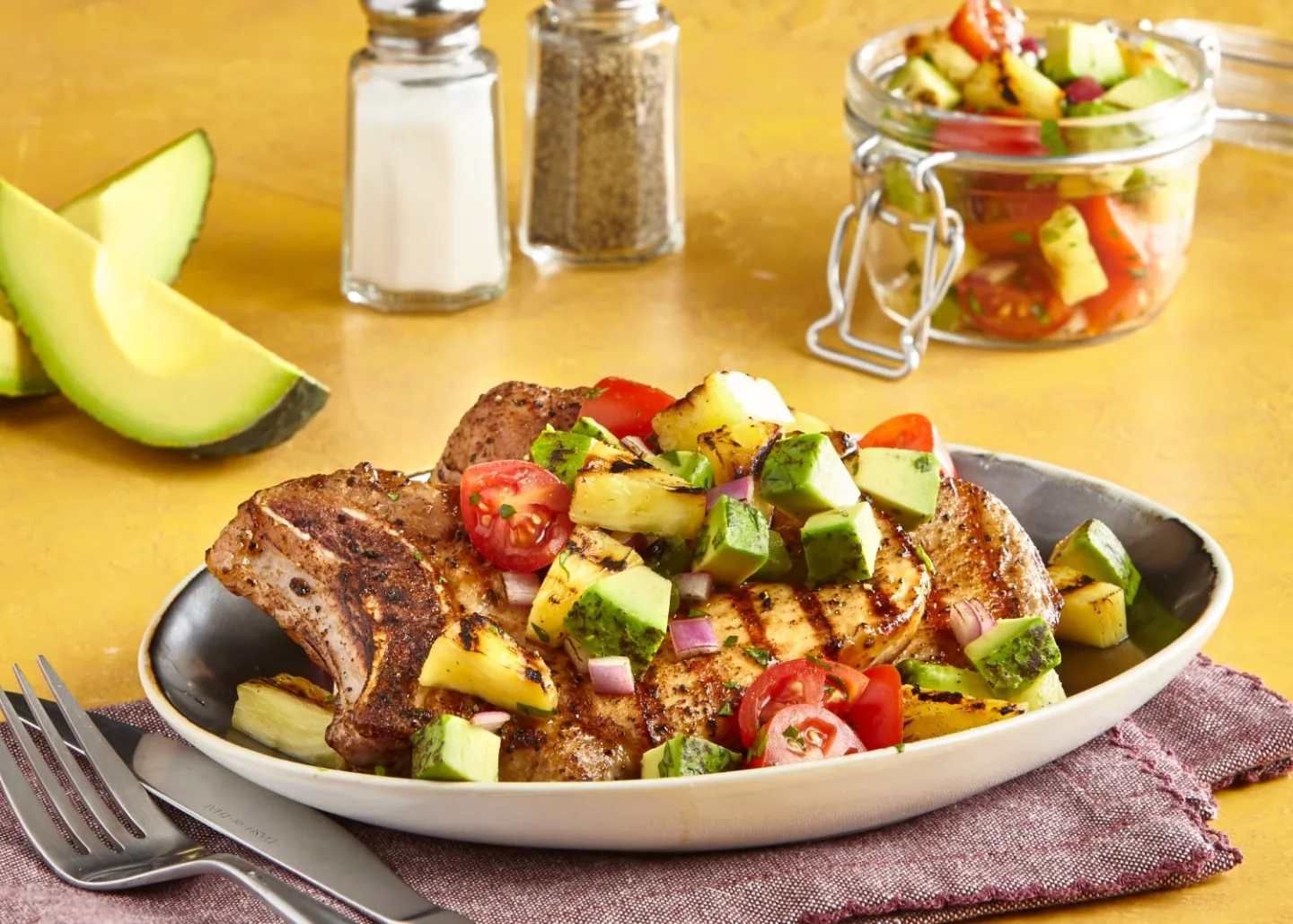 Sweet Pork Chops with Grilled Pineapple Avocado Salsa